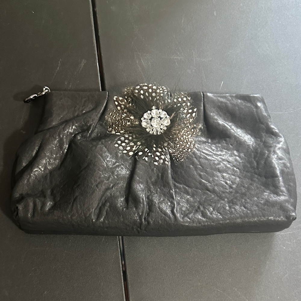 Stella & Dot black leather with feather CZ accent clutch bag